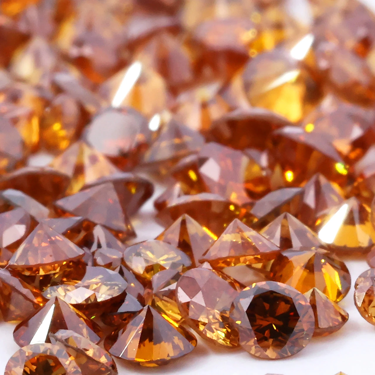 Bulk Melee Diamond Supplier, 0.02ct - 0.07ct Range, SI Clarity Dark Cognac Melee Diamond