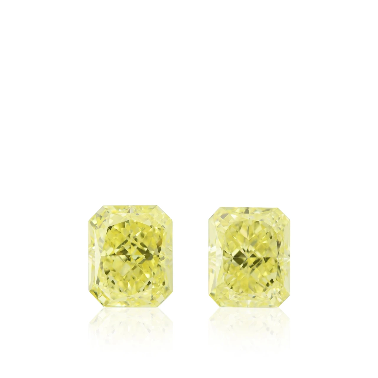1.29 Carat Fancy Yellow Radiant Diamonds VS1 GIA Pair