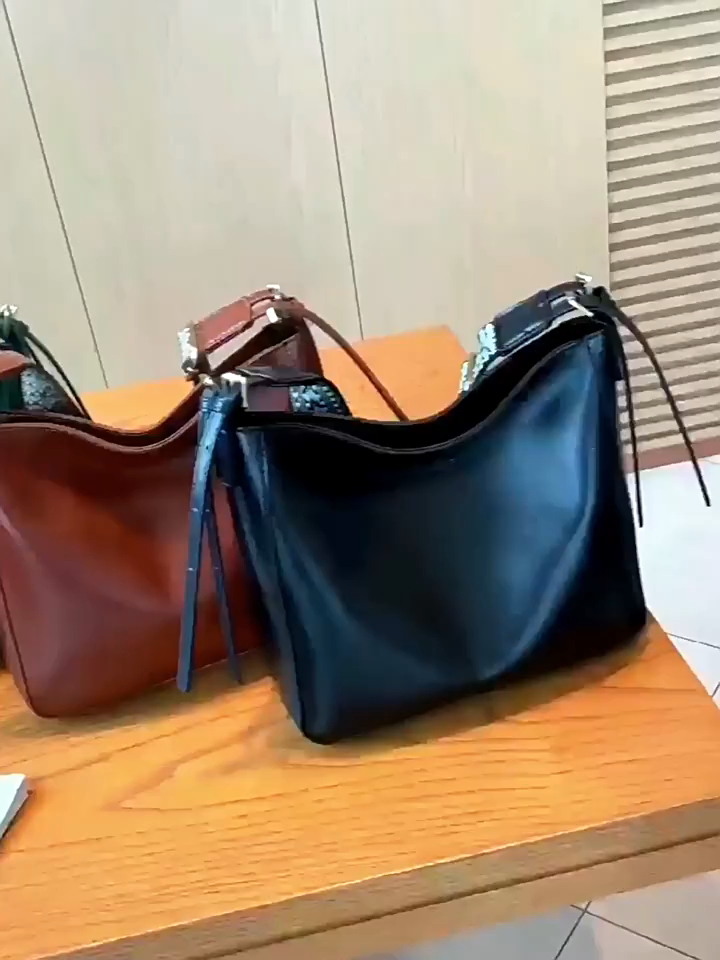 Retro vegetable-tanned cowhide bucket bag, trendy crossbody/shoulder bag, genuine leather women's handbag.
