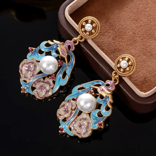 925 sterling silver needle hypoallergenic earrings with faux pearl and red zircon accents